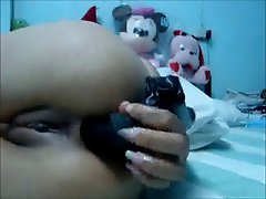 Thai Girl toying and fingering her ass and pussy