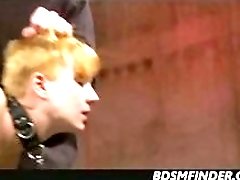 Redhead slave girl receives hard spanking from the BDSM master