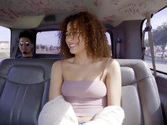 Curly beauty sucks dick very wet before riding it on the back seat