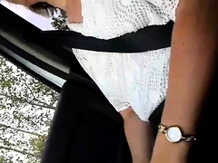 Stacked mature brunette undresses and masturbates in the car