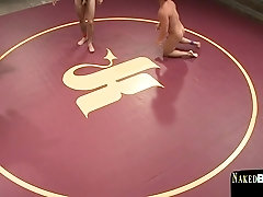 Inked wrestler jock dominates his opponent