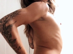 Striking brunette showing off her sexy slim body on webcam