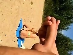 Beach voyeur spies on sexy young babes and strokes his dick