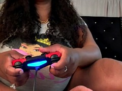 Black beauty and her boobs play video games